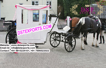 White Antique Horse Drawn Carriage